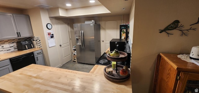 1751 E Canary Way, Eagle Mountain, UT 84005 - kitchen with stainless steel refrigerator with ice dispenser, black dishwasher, gray cabinets, wood counters, and recessed lighting