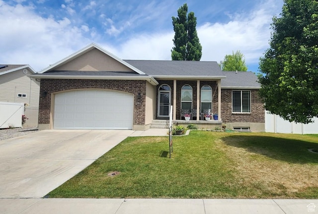 1751 E Canary Way, Eagle Mountain, UT 84005 - single story home with brick siding, an attached garage, concrete driveway, and a porch