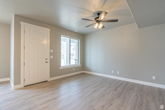 2206 S 1120 W Unit 65, Nibley, UT 84321 - foyer with a textured ceiling, light wood-style floors, and ceiling fan
