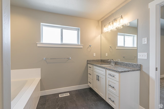 2206 S 1120 W Unit 65, Nibley, UT 84321 - full bathroom featuring vanity and a relaxing tiled tub