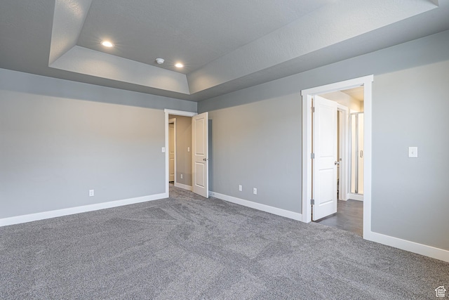 2206 S 1120 W Unit 65, Nibley, UT 84321 - unfurnished bedroom with a raised ceiling, dark colored carpet, and recessed lighting