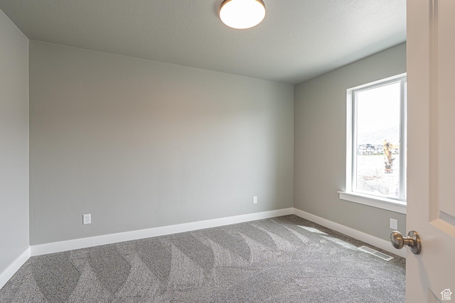 2206 S 1120 W Unit 65, Nibley, UT 84321 - carpeted spare room featuring baseboards