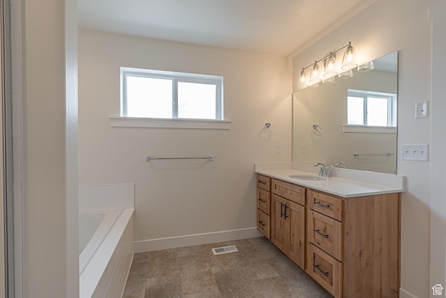 2214 S 1120 W Unit 67, Nibley, UT 84321 - bathroom featuring vanity and a garden tub