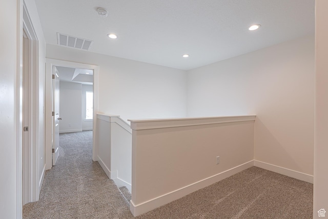 2214 S 1120 W Unit 67, Nibley, UT 84321 - hallway featuring light carpet and recessed lighting