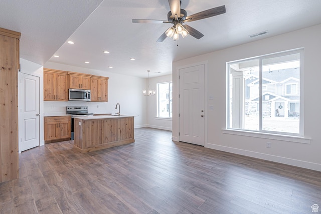 2214 S 1120 W Unit 67, Nibley, UT 84321 - kitchen featuring stainless steel appliances, recessed lighting, a center island with sink, a chandelier, and dark wood-style floors