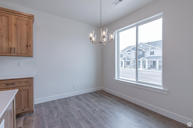 2214 S 1120 W Unit 67, Nibley, UT 84321 - unfurnished dining area with a chandelier and wood finished floors