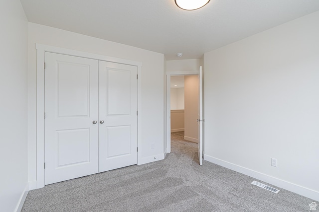 2214 S 1120 W Unit 67, Nibley, UT 84321 - unfurnished bedroom featuring light colored carpet and a closet
