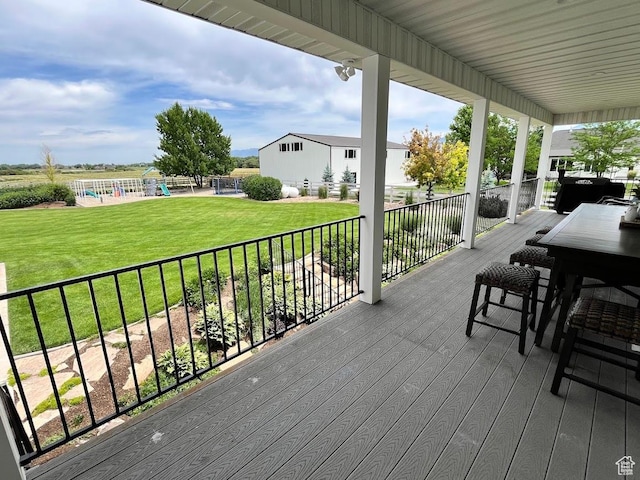 4053 W 3770 S, Wellsville, UT 84339 - wooden deck with a playground and a yard