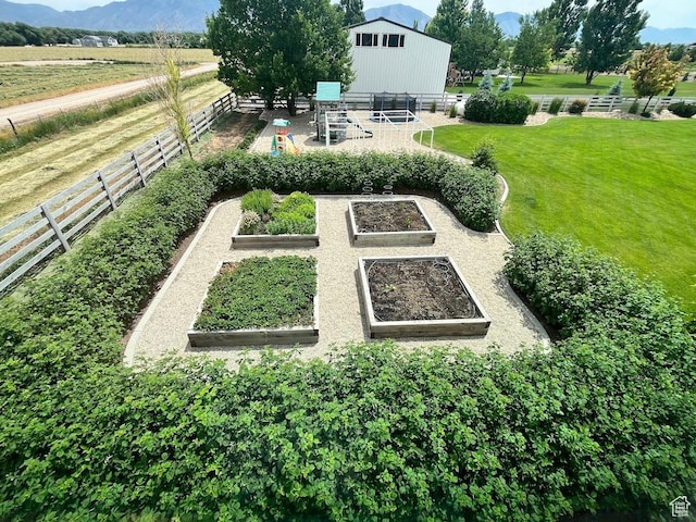 4053 W 3770 S, Wellsville, UT 84339 - view of yard with a vegetable garden, a mountain view, and a view of rural / pastoral area