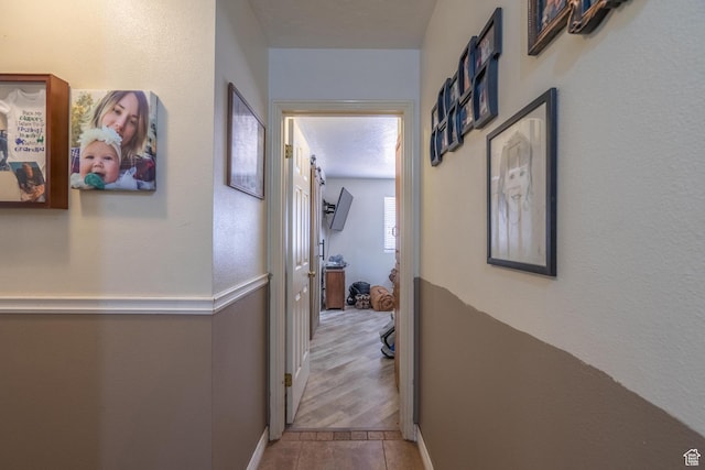 737 Carma Way, Washington, UT 84780 - hall featuring tile patterned floors and baseboards