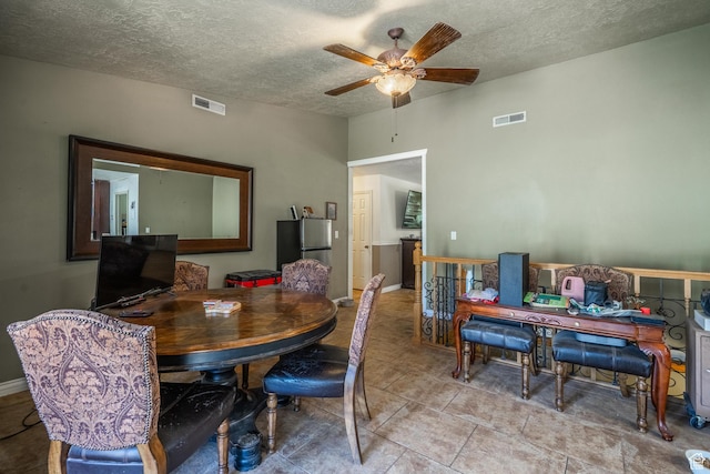 737 Carma Way, Washington, UT 84780 - tiled dining space featuring a ceiling fan and a textured ceiling