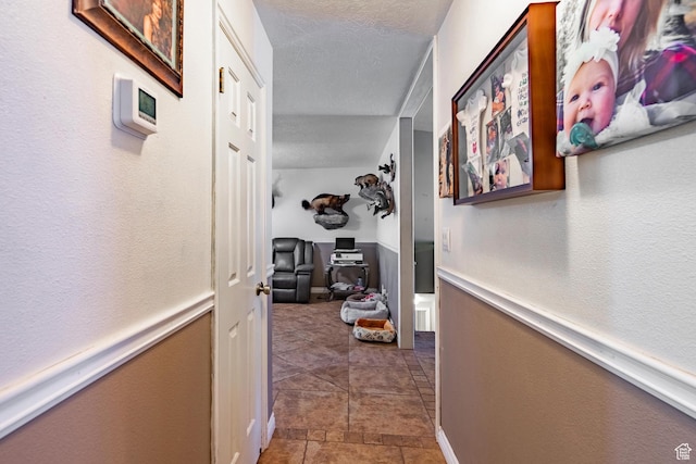 737 Carma Way, Washington, UT 84780 - corridor featuring a textured ceiling