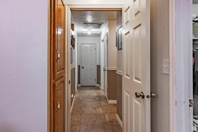 737 Carma Way, Washington, UT 84780 - hall featuring tile patterned flooring and baseboards