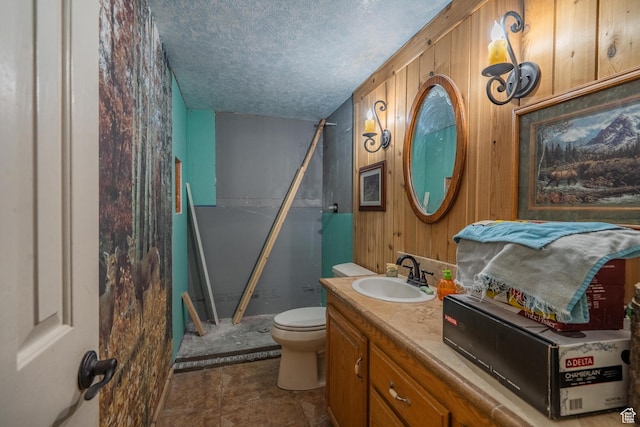 737 Carma Way, Washington, UT 84780 - full bath with a textured ceiling, a shower, vanity, and wood walls