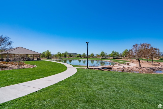737 Carma Way, Washington, UT 84780 - surrounding community featuring a yard and a water view