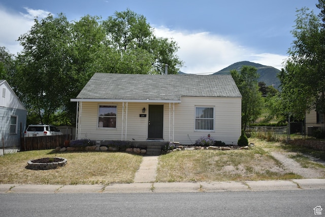 179 S 6th St E, Tooele, UT 84074 - bungalow featuring covered porch and a fire pit
