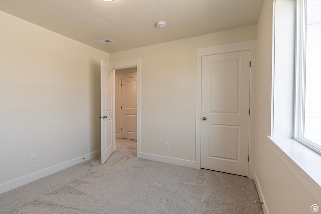 2281 S 1050 W Unit 97, Nibley, UT 84321 - unfurnished bedroom featuring light colored carpet and baseboards