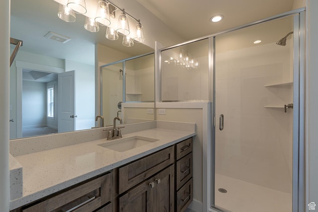 2281 S 1050 W Unit 97, Nibley, UT 84321 - bathroom featuring vanity, a stall shower, and recessed lighting