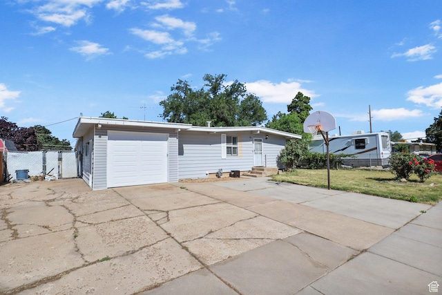 6033 S 2100 W, Roy, UT 84067 - view of front of property featuring entry steps, driveway, and a garage