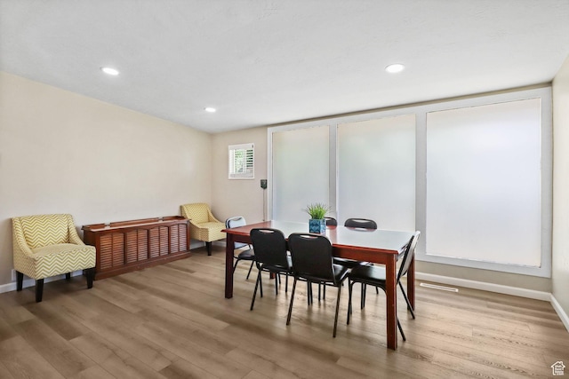 6033 S 2100 W, Roy, UT 84067 - dining space with wood finished floors and recessed lighting
