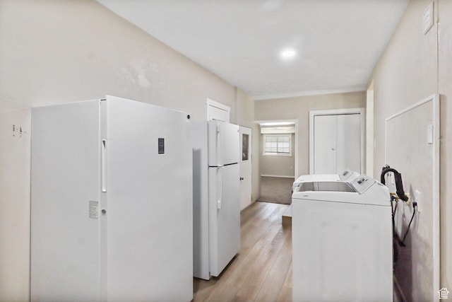 6033 S 2100 W, Roy, UT 84067 - laundry area featuring separate washer and dryer and light wood-type flooring