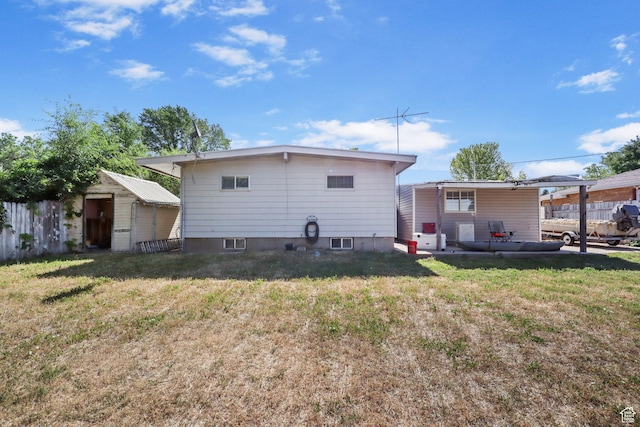 6033 S 2100 W, Roy, UT 84067 - back of property with a storage unit and a patio area