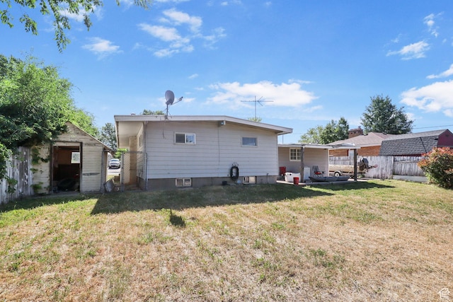6033 S 2100 W, Roy, UT 84067 - back of property with a storage unit