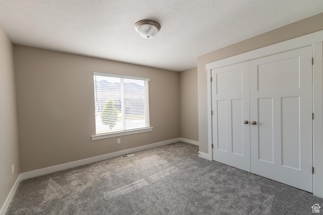3867 N Chapman Dr, Eagle Mountain, UT 84005 - unfurnished bedroom featuring carpet flooring and a closet