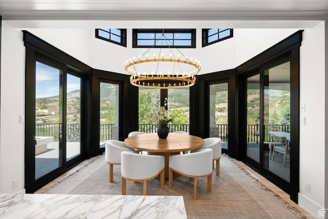 1643 E Box Elder Dr, Alpine, UT 84004 - dining space with a chandelier and healthy amount of natural light