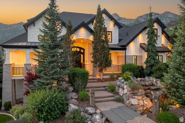 1643 E Box Elder Dr, Alpine, UT 84004 - craftsman-style house with a standing seam roof and a mountain view