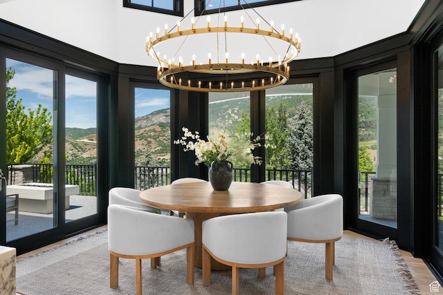 1643 E Box Elder Dr, Alpine, UT 84004 - dining room with a chandelier, a mountain view, and plenty of natural light