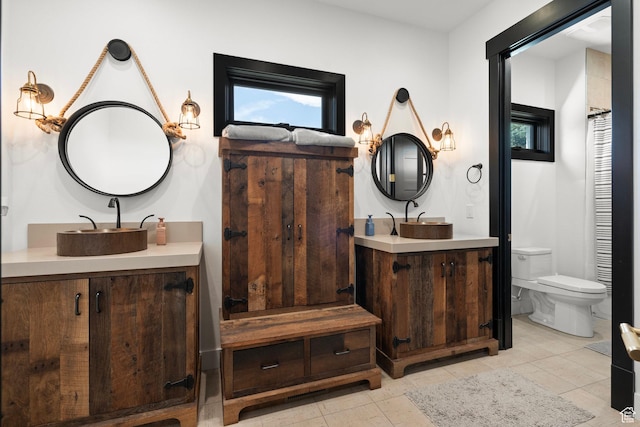 1643 E Box Elder Dr, Alpine, UT 84004 - full bathroom with two vanities and tile patterned floors
