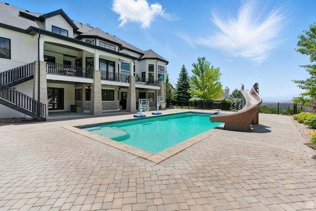 1643 E Box Elder Dr, Alpine, UT 84004 - view of swimming pool with a water slide, a patio area, and stairway