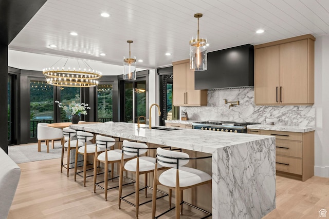 1643 E Box Elder Dr, Alpine, UT 84004 - kitchen featuring wall chimney exhaust hood, a chandelier, a large island, backsplash, and recessed lighting