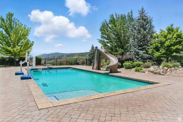 1643 E Box Elder Dr, Alpine, UT 84004 - view of pool with a water slide, a patio, and a mountain view