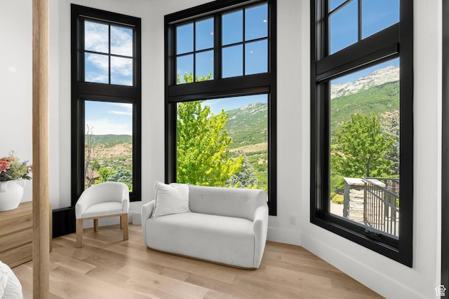1643 E Box Elder Dr, Alpine, UT 84004 - sitting room with a high ceiling, light wood finished floors, and a mountain view