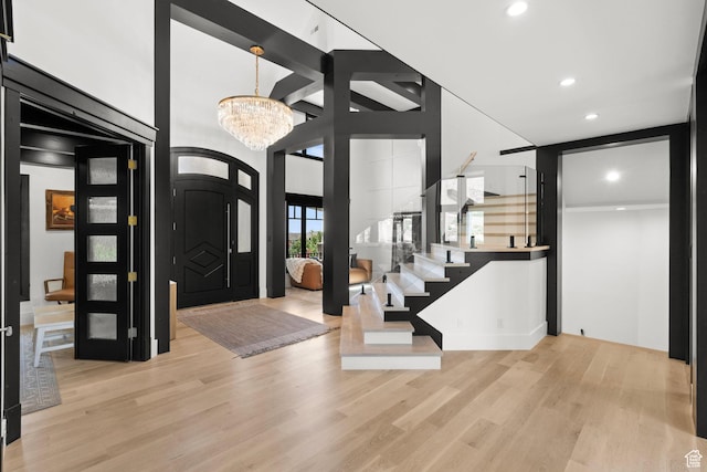 1643 E Box Elder Dr, Alpine, UT 84004 - entrance foyer with wood finished floors, a chandelier, and recessed lighting