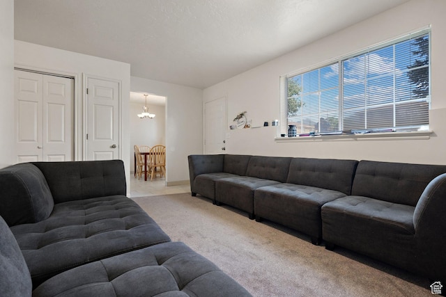 835 E 500 N, Spanish Fork, UT 84660 - carpeted living room featuring a chandelier and baseboards