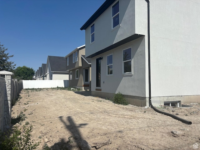 1719 W Brocious Way S Unit 301, South Jordan, UT 84095 - back of property featuring stucco siding