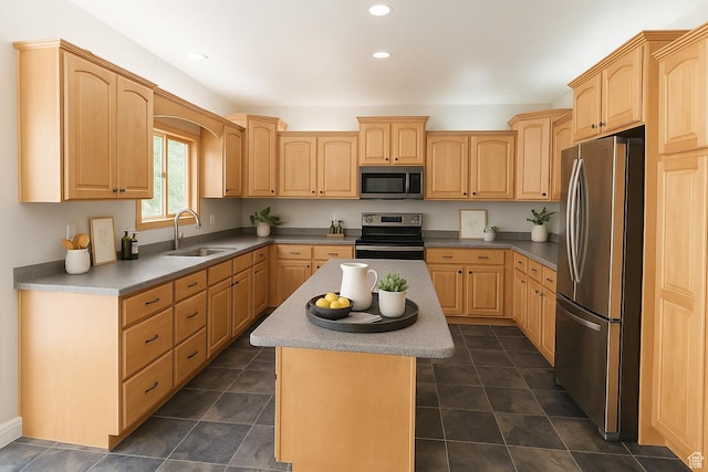 271 E Eagle Ridge Dr, North Salt Lake, UT 84054 - kitchen with appliances with stainless steel finishes, light brown cabinetry, a kitchen island, recessed lighting, and light countertops