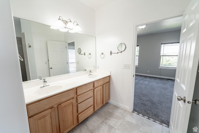 271 E Eagle Ridge Dr, North Salt Lake, UT 84054 - bathroom featuring double vanity and a chandelier