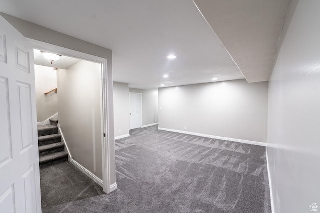 271 E Eagle Ridge Dr, North Salt Lake, UT 84054 - finished below grade area with dark carpet, stairs, and recessed lighting