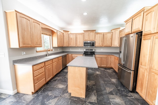 271 E Eagle Ridge Dr, North Salt Lake, UT 84054 - kitchen with appliances with stainless steel finishes, light brown cabinets, a kitchen island, recessed lighting, and dark stone finish flooring