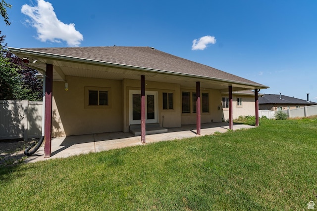 271 E Eagle Ridge Dr, North Salt Lake, UT 84054 - rear view of property featuring stucco siding, a patio, and roof with shingles