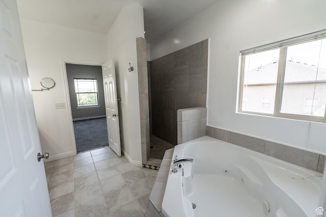 271 E Eagle Ridge Dr, North Salt Lake, UT 84054 - bathroom featuring a whirlpool tub, tiled shower, and tile patterned floors