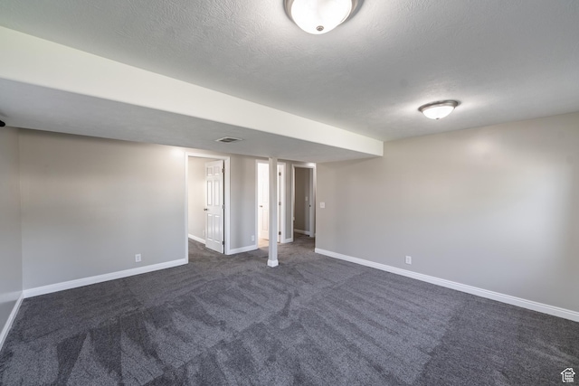 271 E Eagle Ridge Dr, North Salt Lake, UT 84054 - finished below grade area featuring baseboards and dark carpet