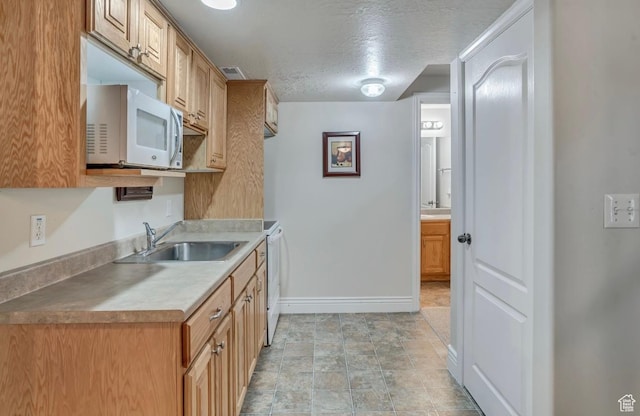1017 E 450 N Cir N, American Fork, UT 84003 - kitchen featuring white microwave, a textured ceiling, and light countertops