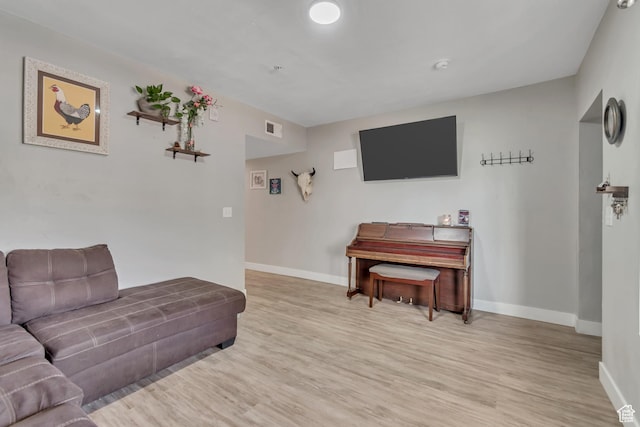 2743 Grant Ave Unit 2B, Ogden, UT 84401 - living room with baseboards and light wood-style floors