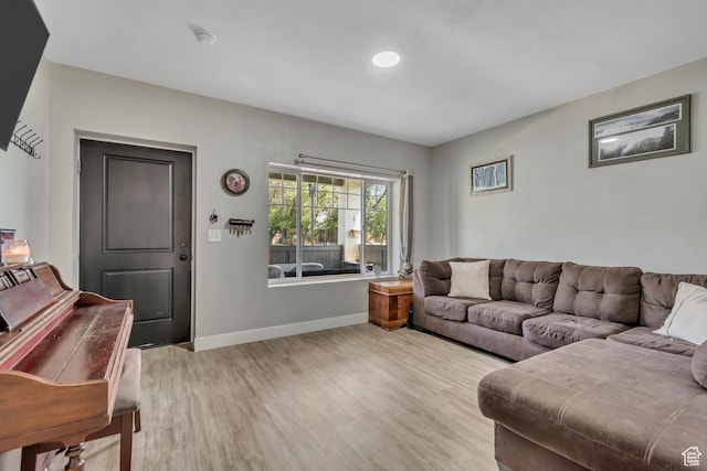 2743 Grant Ave Unit 2B, Ogden, UT 84401 - living area featuring light wood-style floors and baseboards