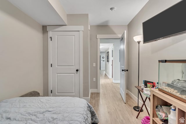 2743 Grant Ave Unit 2B, Ogden, UT 84401 - bedroom featuring light wood-type flooring and baseboards